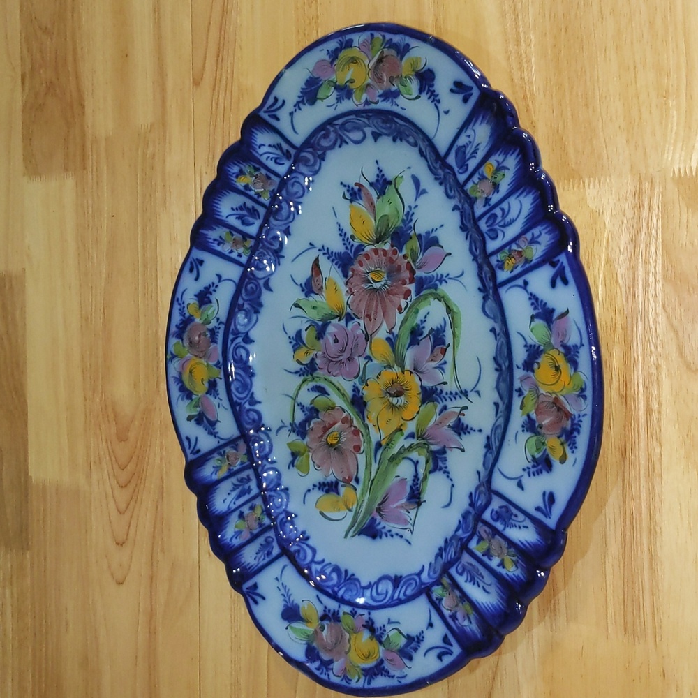A blue hand painted serving plate